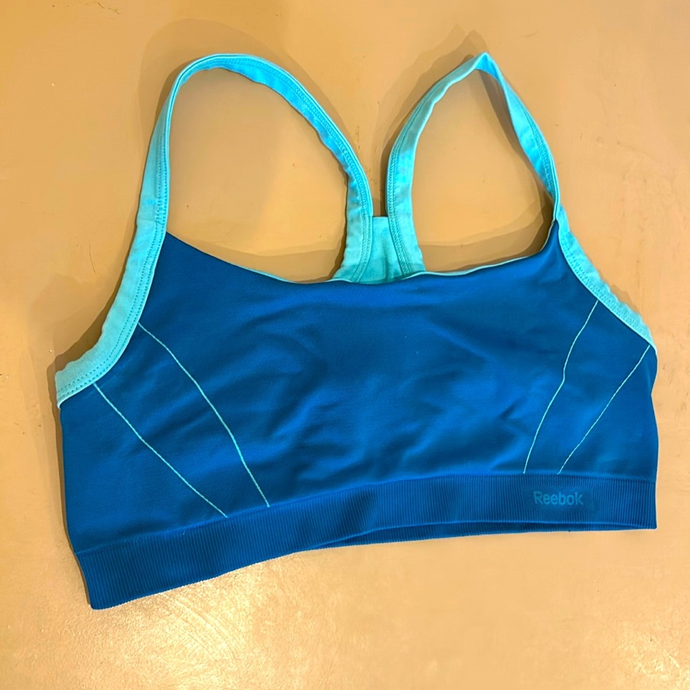 Reebok women’s sports bra two-tone blue with floral accent size Large
